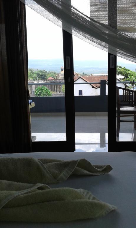 Kadek Homestay Амед Экстерьер фото